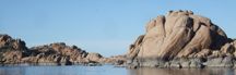 image of the Granite Dells in Arizona, orange rock boulder mounds above blue water, M. Hauk photographer
